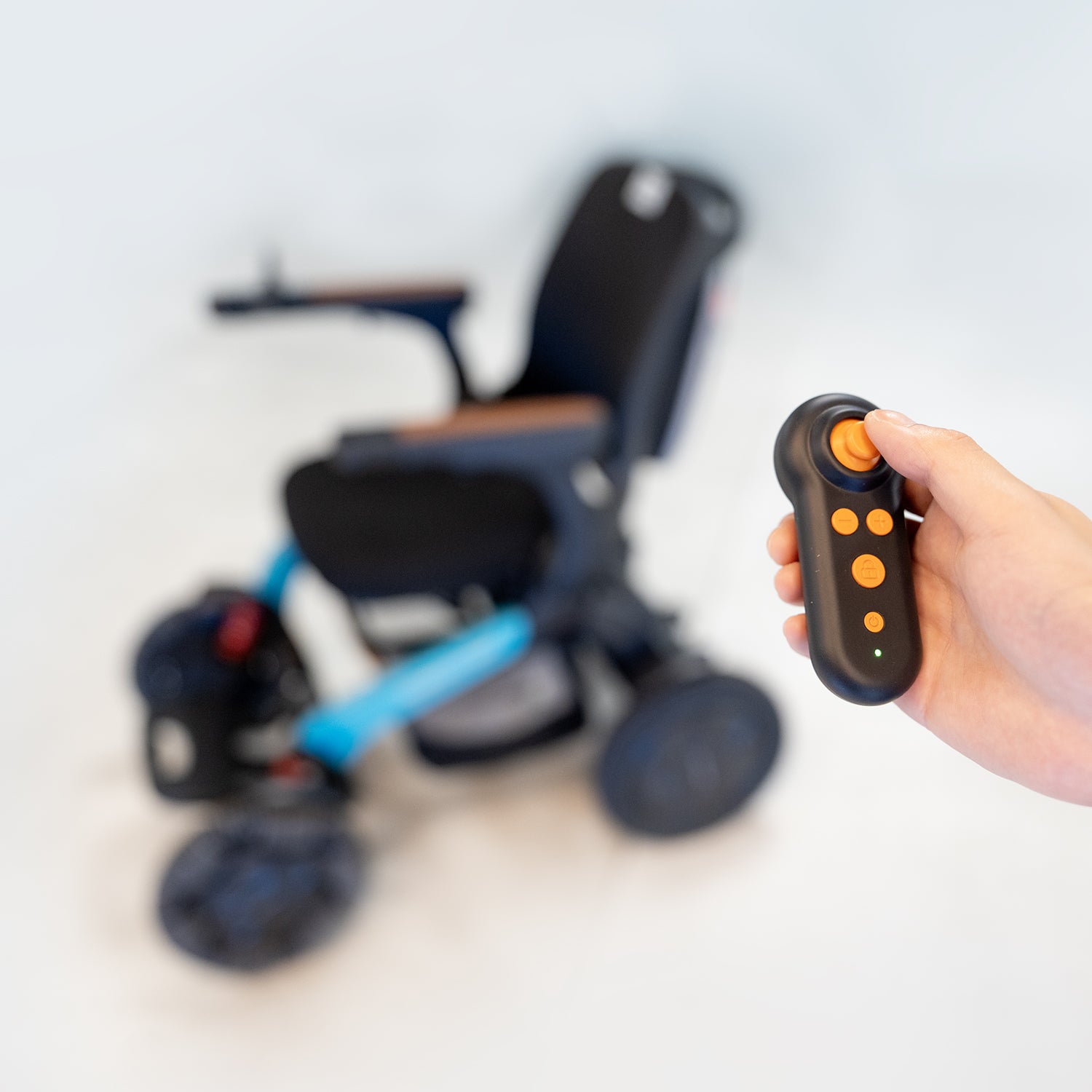Wireless anti-theft remote for power wheelchair
