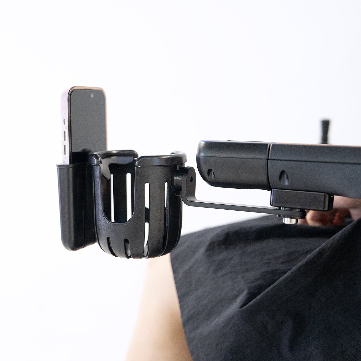 Stable cup holder for standard wheelchair armrests